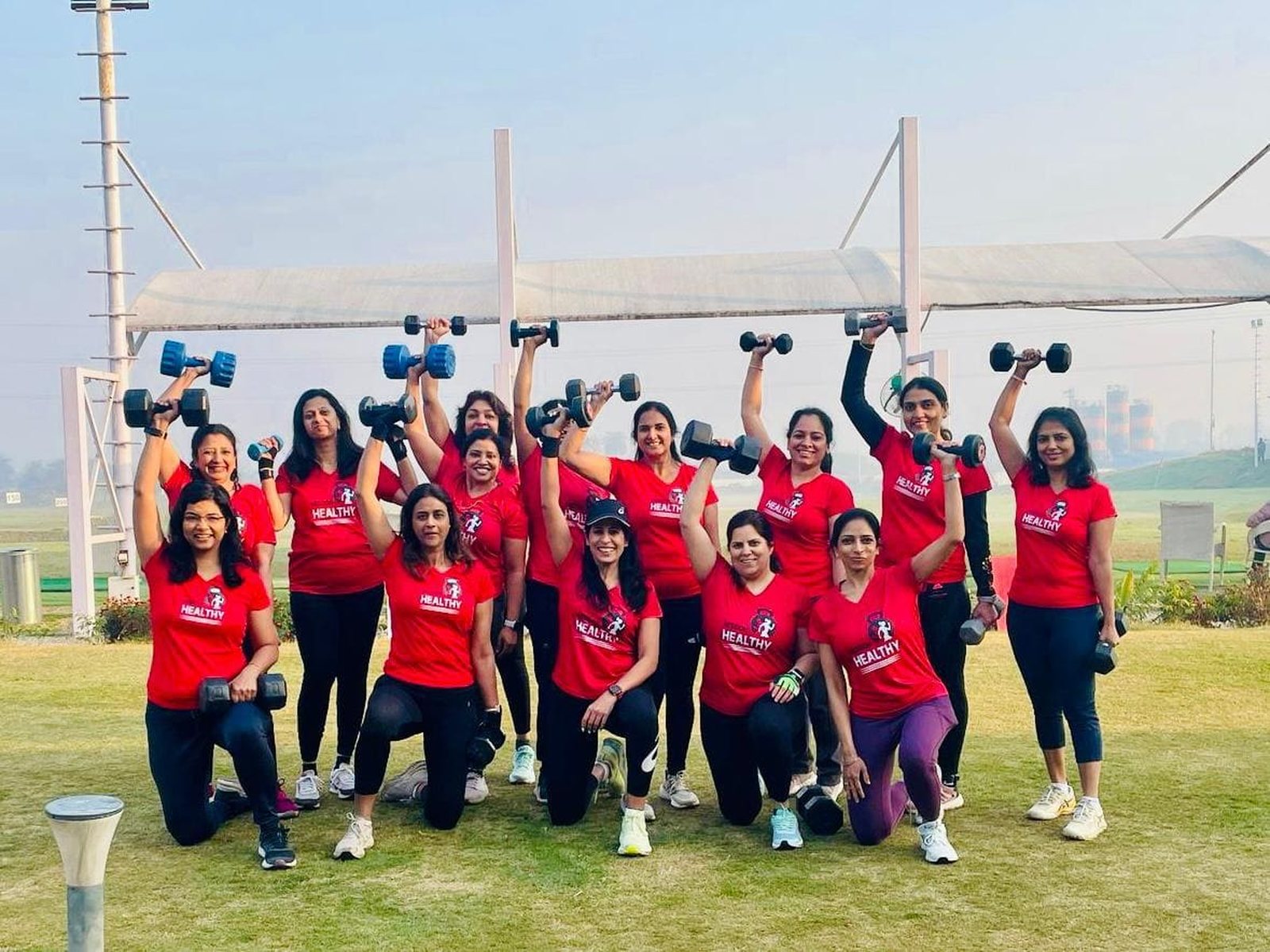 Mission Healthy with Mihika &mdash; outdoor training session with dumbbells overhead